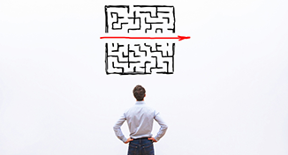 Image of man evaluting technology, a barcode