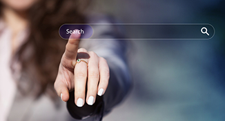 Image of Person touching search option on screen