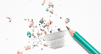 Image of A pencil scribbling on a piece of paper