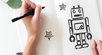 Image of Hand drawing a robot